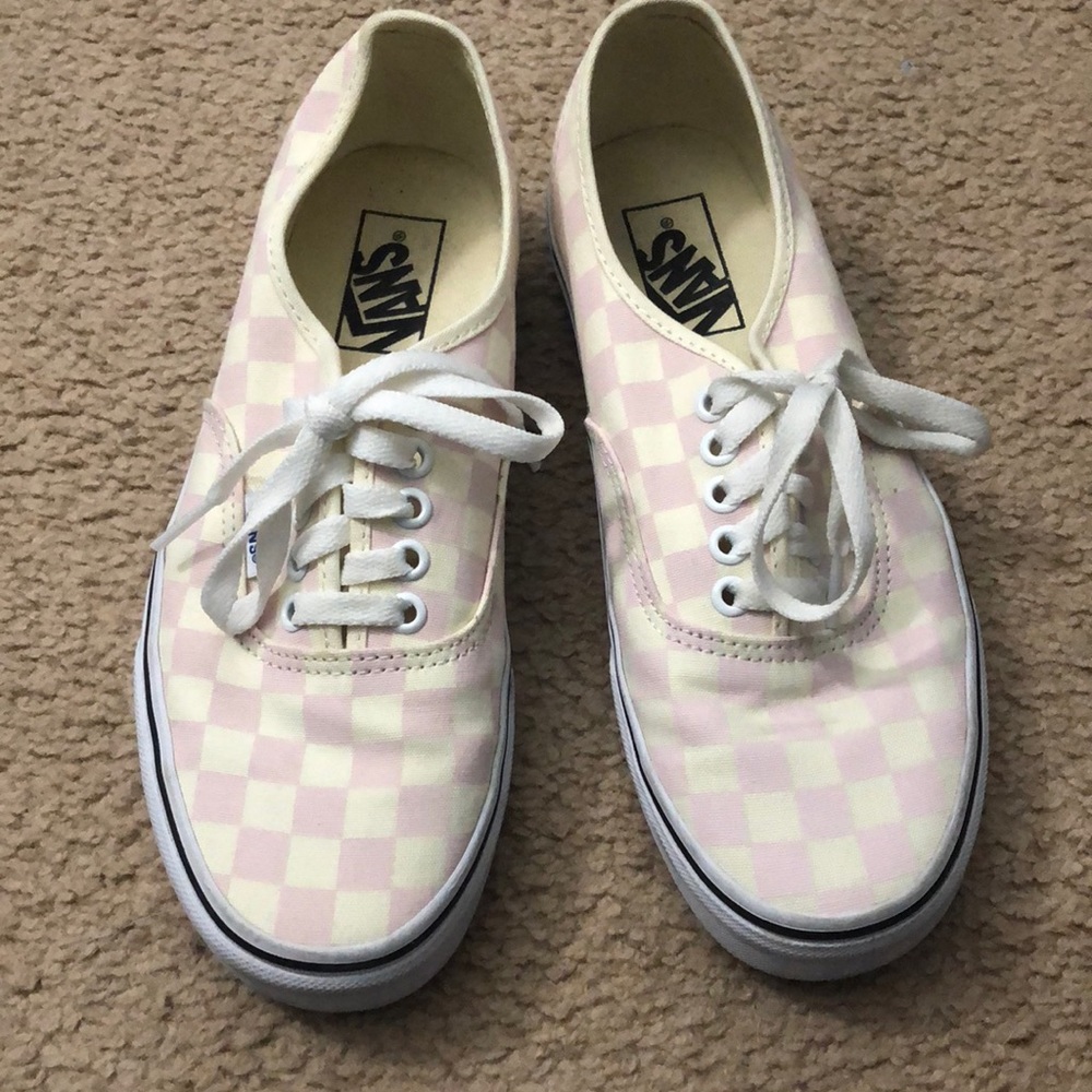 Pink checkered vans.